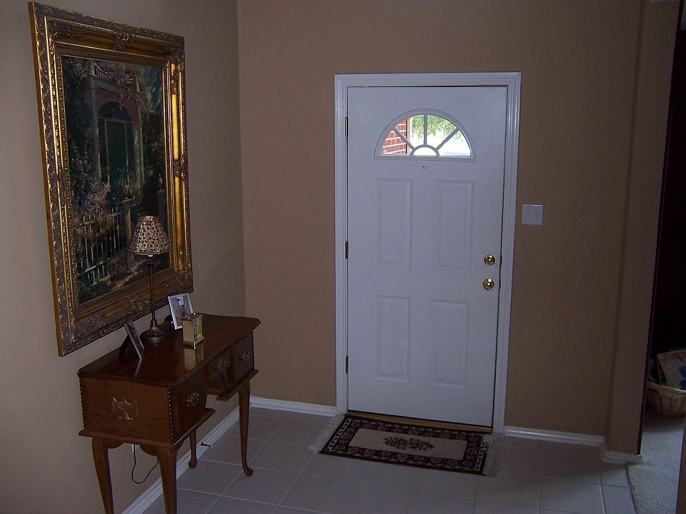 Warm, welcoming tiled entryway 