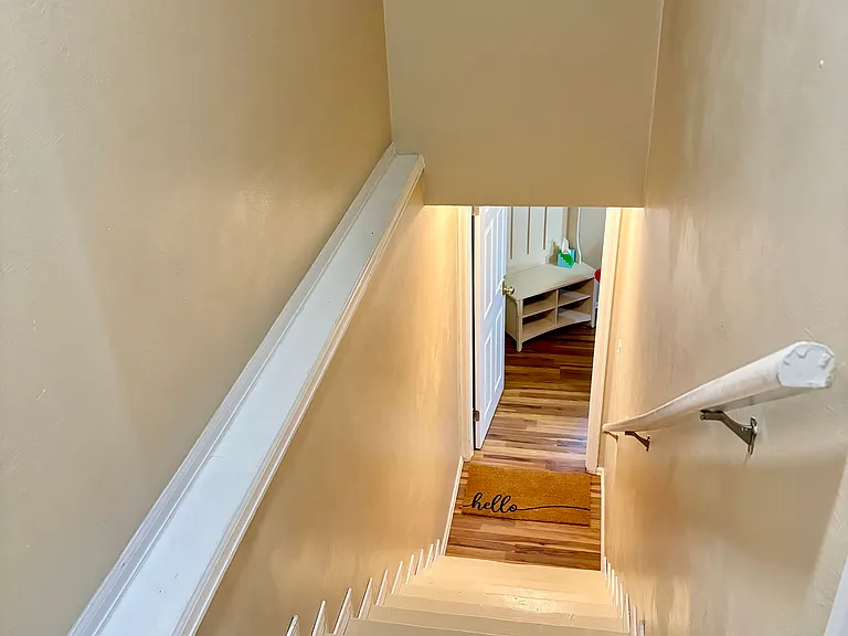 Independent Keypad Entry through back door, Stairway with motion-sensor light, keypad entry into Apt. at bottom of stairs