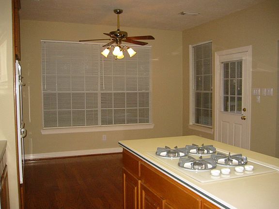 Enjoy your morning latte' in this window-filled breakfast area
