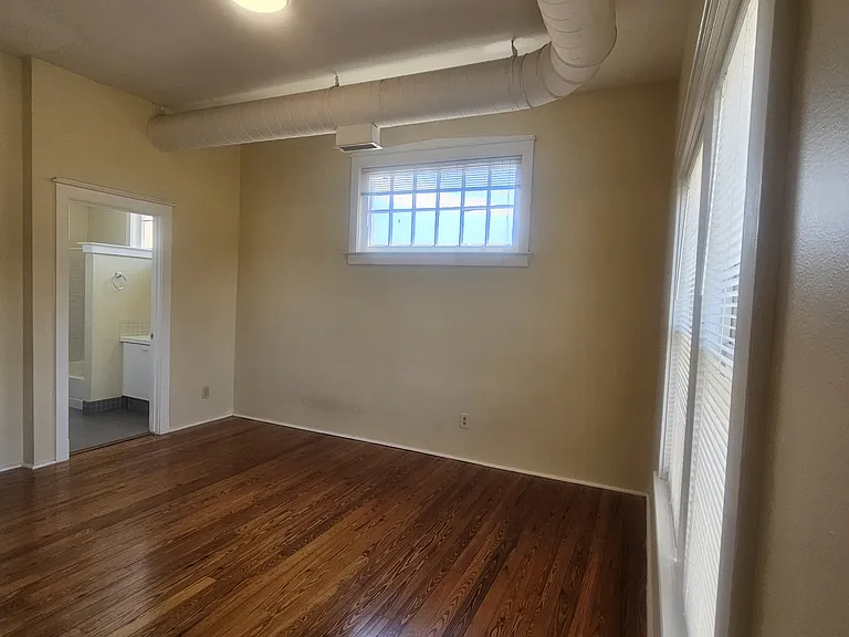 Bedroom with view to bath