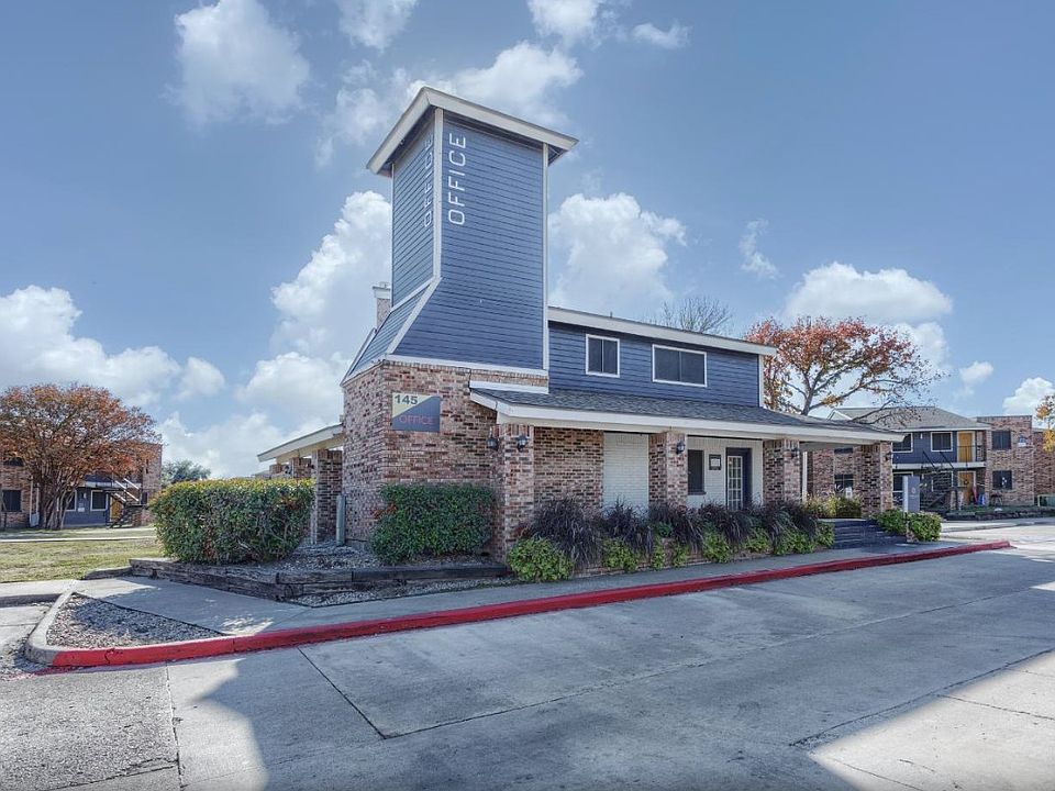 Leasing office exterior with tower and updated facade