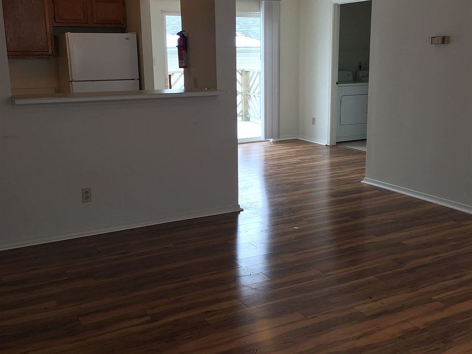 Open concept LR/DR/kitchen with hardwood floors