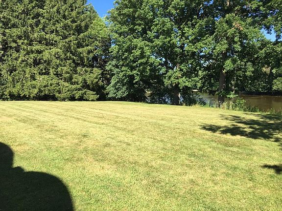 Large Yard with river front views and access