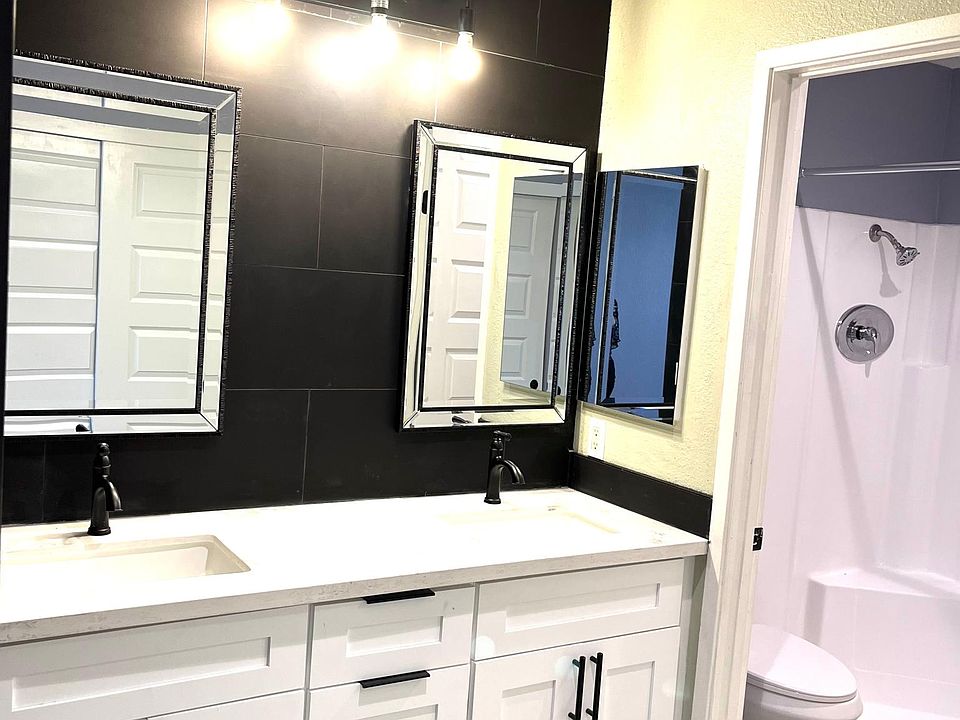 Primary Vanity, dual sinks/mirrors, shower, bathroom - fully remodeled, new everything even the toilets are new.