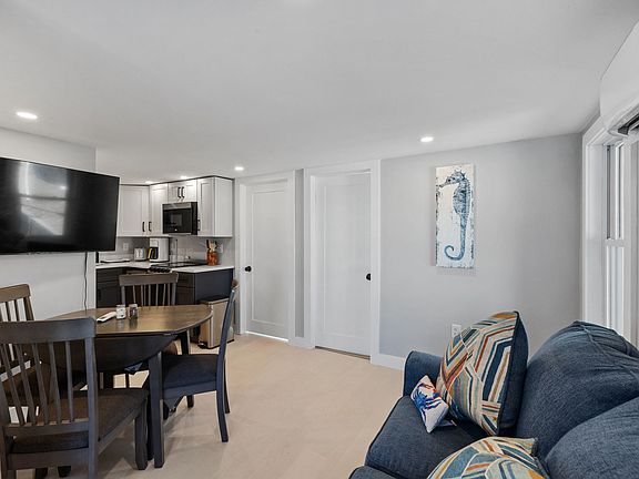 Open living space with SmarTV, complete with various streaming options.