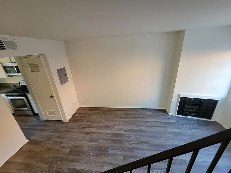 Living Rm, Gas Fireplace and Kitchen Entrance