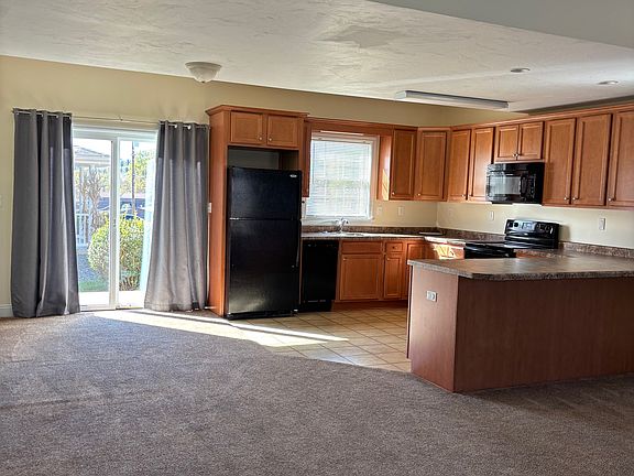 Kitchen and Dining area, with sliding door to back patio