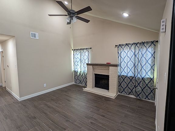 Cozy Living and Dining with open concept and fireplace