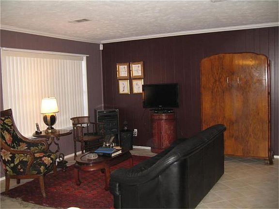 Den with Tile Flooring