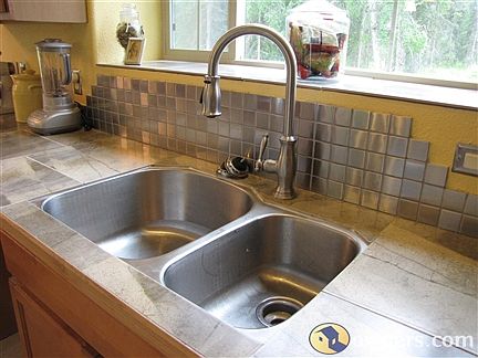 Stainless oversized sink & backsplash