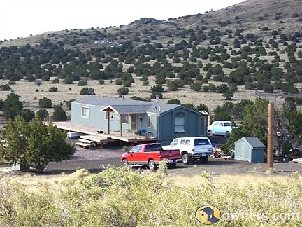 Full view of house and surrounding acerage!