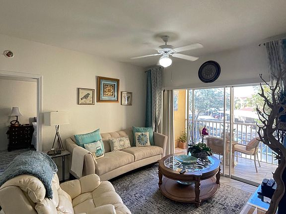 Living room area with outside screened lanai