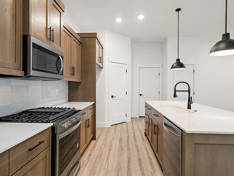 Included: Refrigerator, gas range/stove, washer/dryer