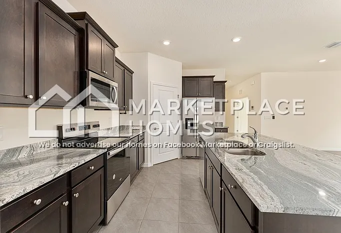 4170 NW 48th Terrace Rd — Photo 8
