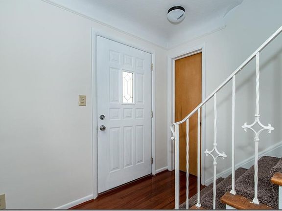Spacious Entry Foyer leading to the Living Room, Family/Media/or Dining Room and the 2nd Floor Bedrooms