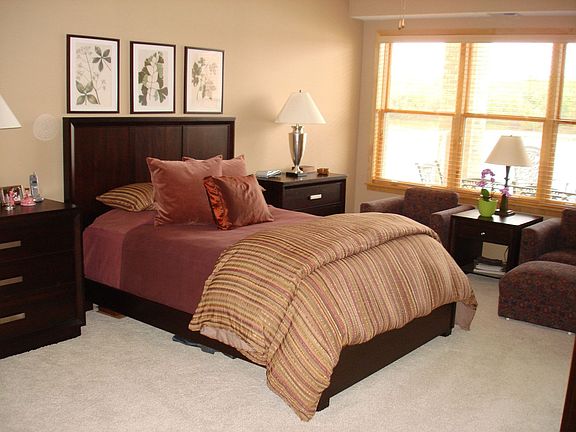 The master bedroom features maple woodwork neutral carpet, and great views!