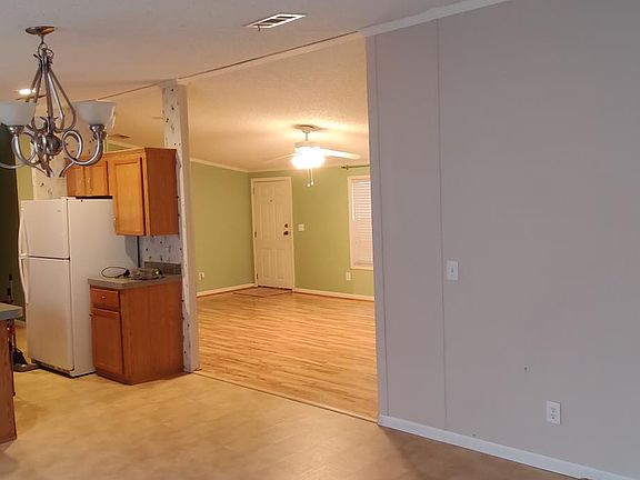 View from second living room to the entry door. Nearly 2,000 square feet of space inside.