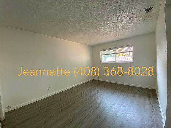 Master bedroom with brand-new vinyl flooring and closet sliding door