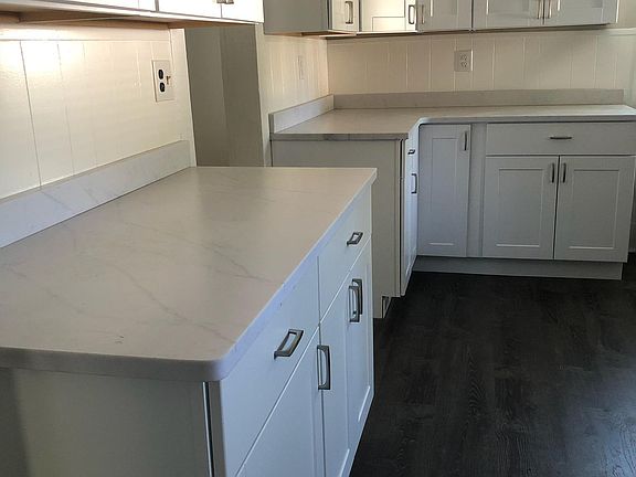 renovated kitchen: new floors, quartz counter top, new stainless steel appliances, new cabinets