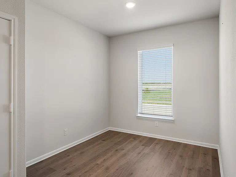 The dining room has a large window that lets in great, natural light.