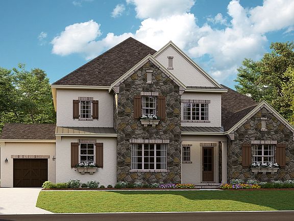 Monterey - French Cottage 3-Car Side Load Garage Note Renderings may show optional features