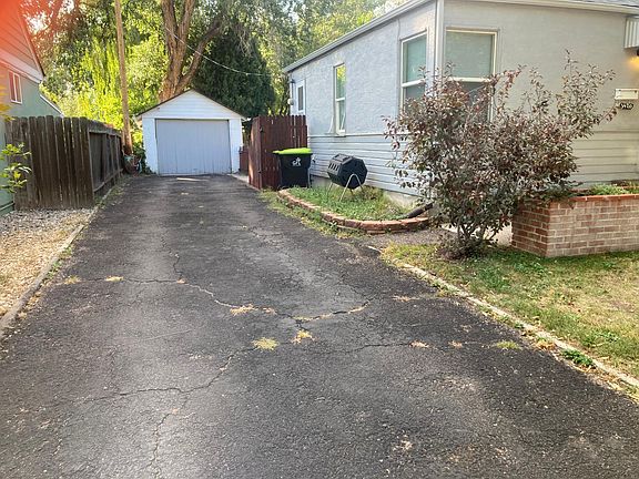 driveway and side of house to garage and main access to backyard