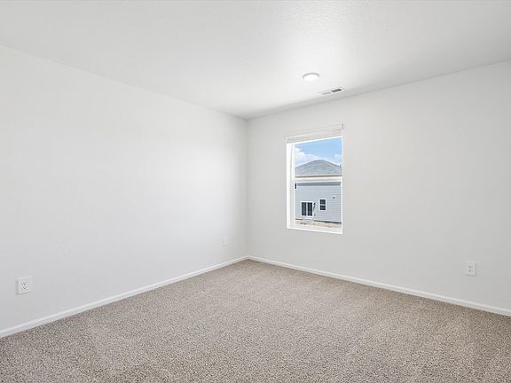 The Monarch floorplan image taken at a Meritage Homes community in Johnstown, CO.