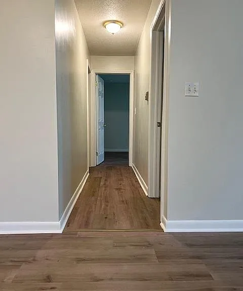 HALL TO 2 BEDROOMS AND FULL BATH