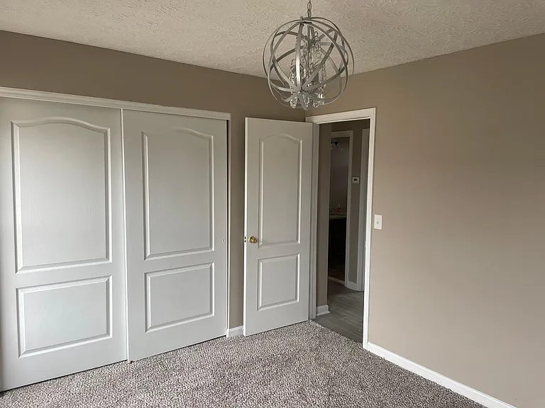 Double closet of 2nd upstairs bedroom.
