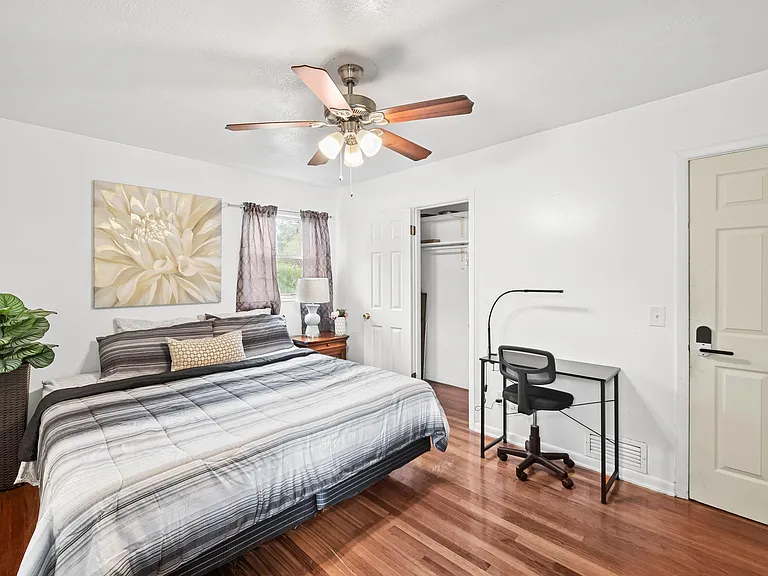 Private Bathroom - Large master bedroom with 40' TV, large closet, desk & chair, dresser, mirror and night stand