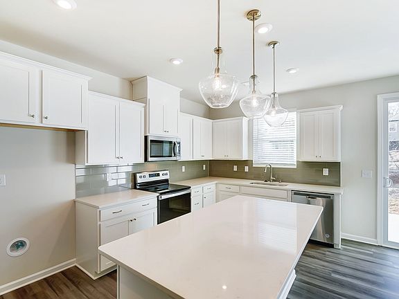 Photo representation of the Briana plan. Colors, finishes and options will vary.