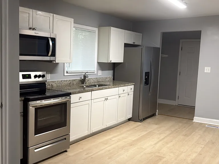 709 Logan St — Photo 3