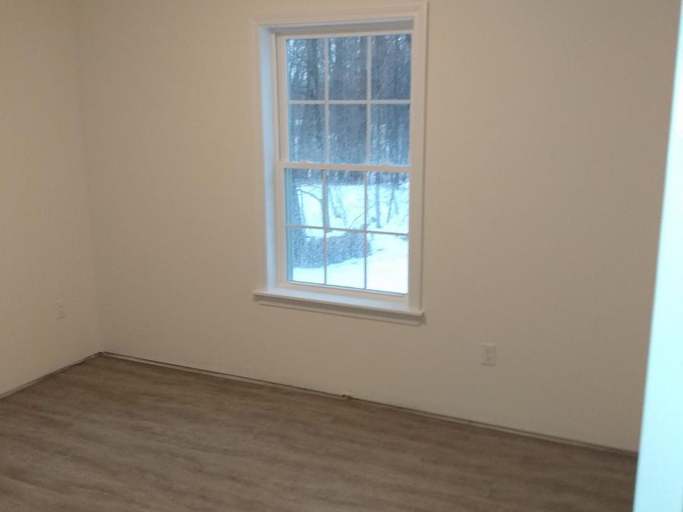 Bedroom, nice view of trees, and yard, very private.