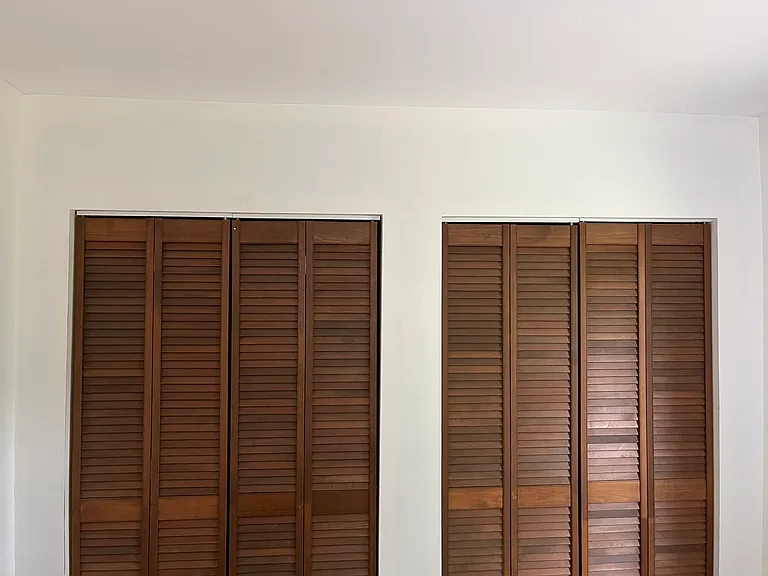 Bedroom three with two large closets.