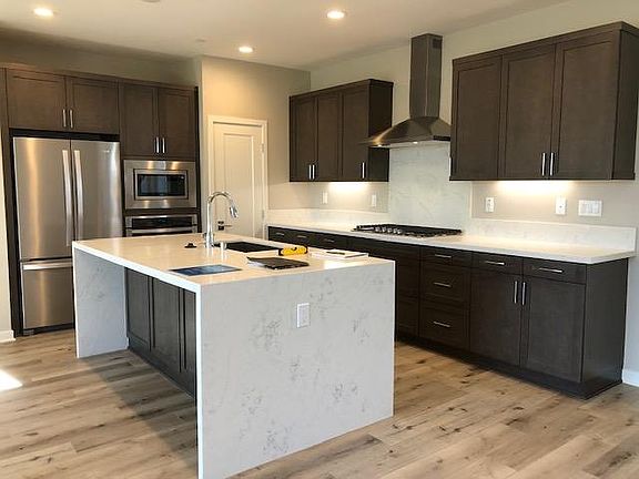 Chef's kitchen with waterfall island