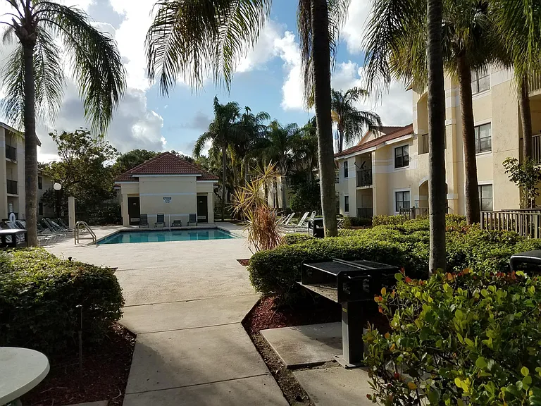 You will find BBQ's near pools, like this one in this photo. Please note that the 2nd community pool is in the background.