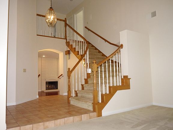 View from living room with cathedral ceiling