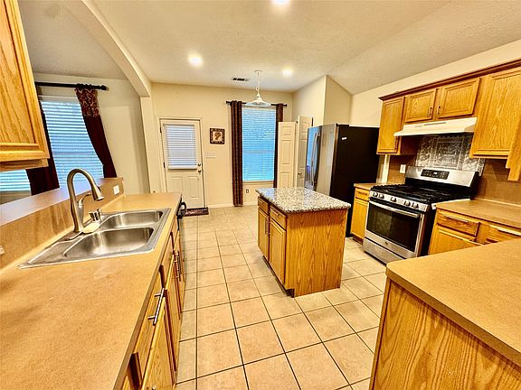 Kitchen viewing exit to backyard