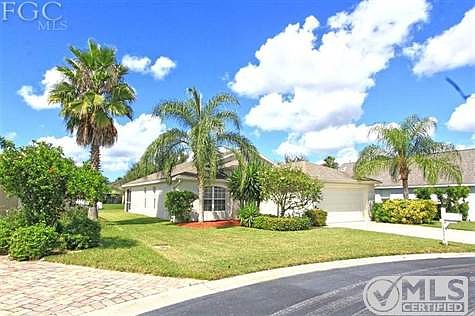 Front Left view -- Well Manicured lawn and landscaping