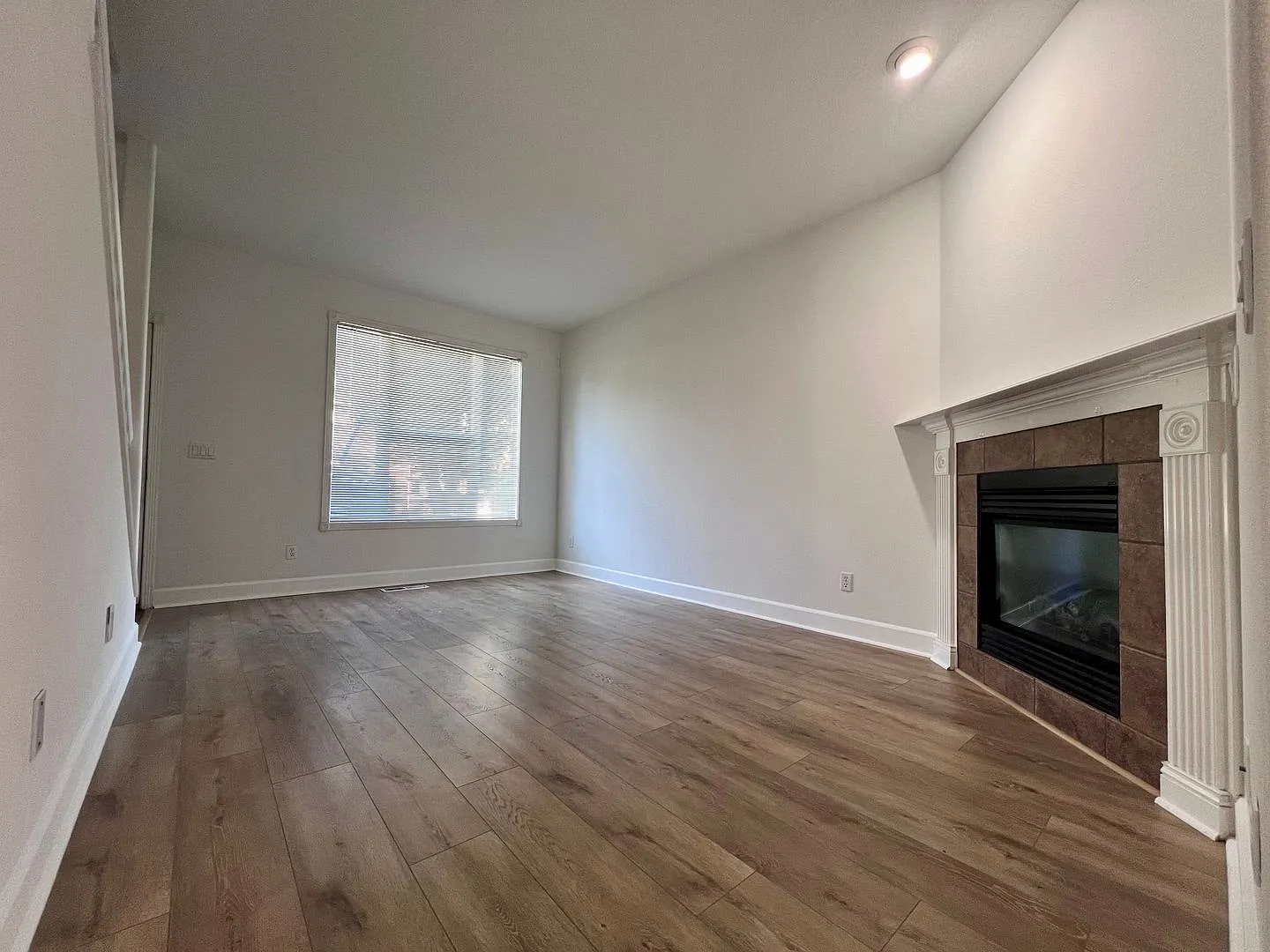 Move-In Special 1/2 Off First Month's Rent! Charming 3-Bedroom End-Unit Townhome With Attached Ga... — Photo 4