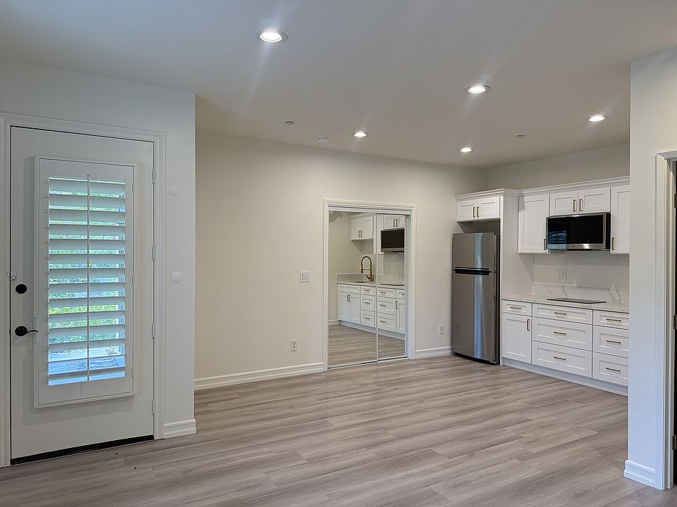 Private entrance leading to a bright, open living space