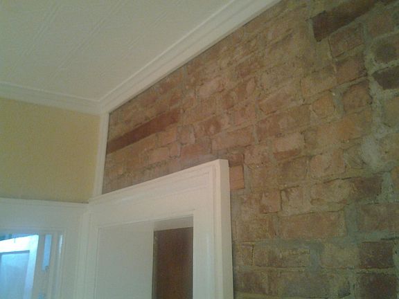Exposed brick accent wall