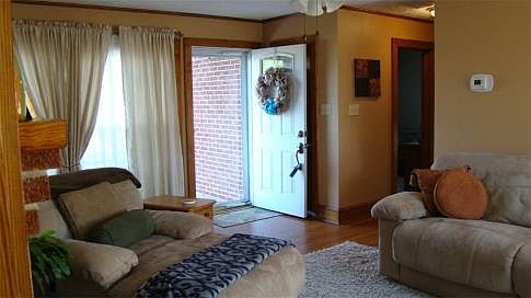 Living Room Looking Toward Front Door & COat Closet