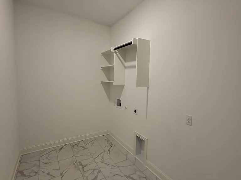 Washer Dryer large room with extra storage for secondary refrigerator