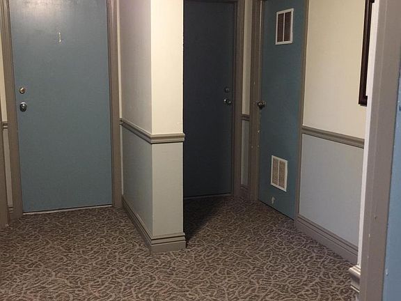 Coin/card operated laundry and trash room on same floor