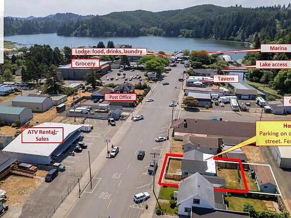Great location! Walk to everything. See red box. The home with front and backyards. Proxity to everything you need: groceries, lake, fishing restaurants, bar, marina, etc.