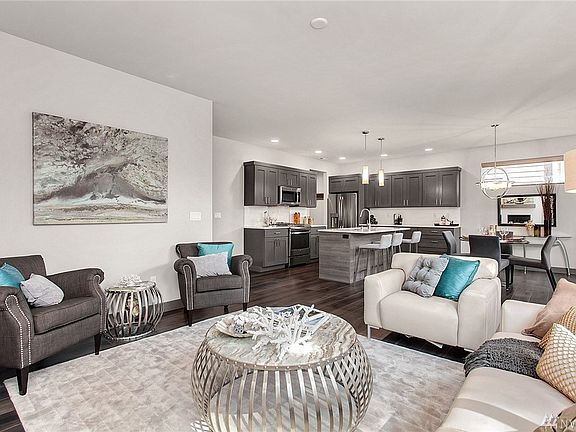 This photo is of the Model Home (Spruce) on Lot 26. Disclaimer: Renderings, photos, floor plans, prices, and all content, including all verbiage, is subject to change at any time. Call Bruce Lystad for details.