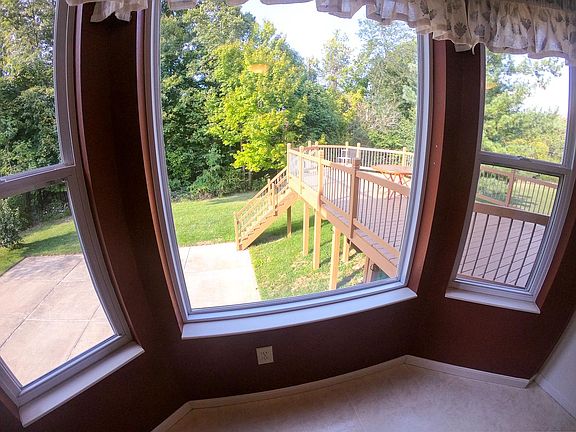 View of backyard from eat-in Kitchen