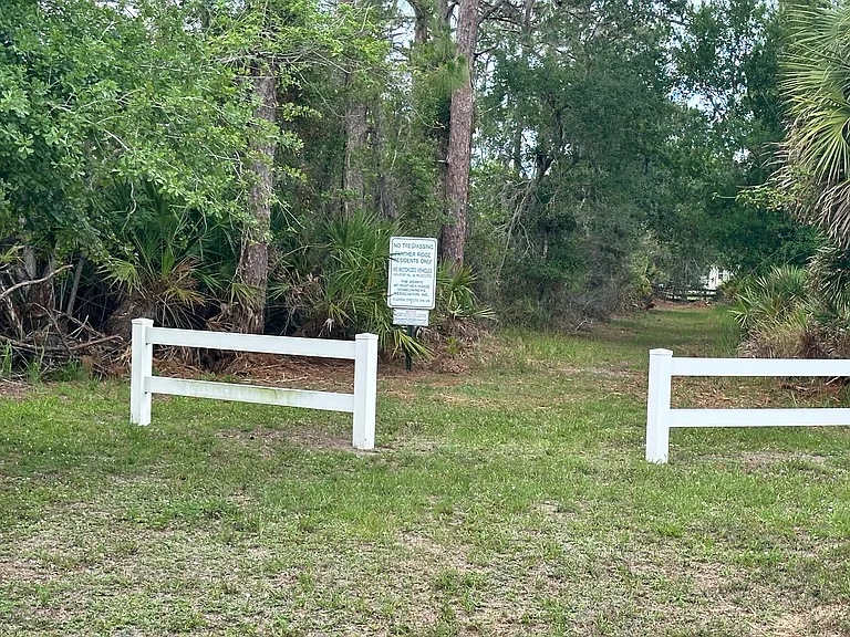 Entrance to Horse Trails directly across the street from Gated Driveway.