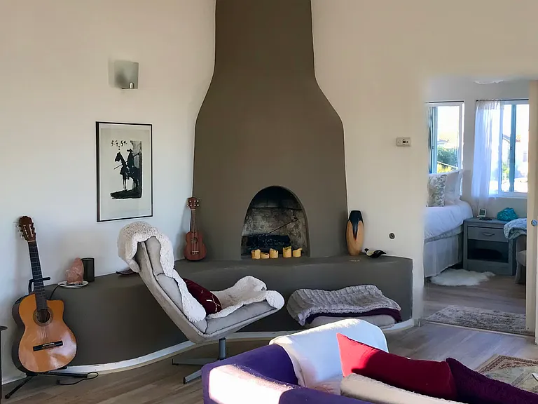 A kiva fireplace--fun in the summer with candles!